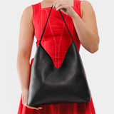 Pebbled--black Oversized | Model wearing large shoulder bag with magnetic snap closure