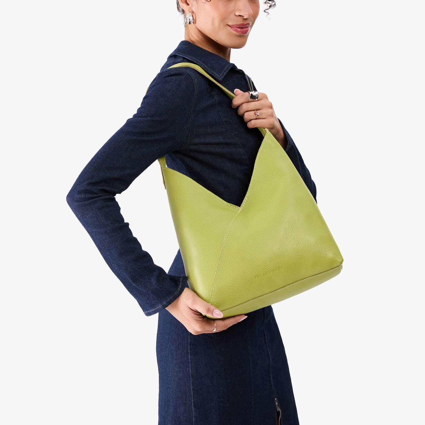 Wasabi*Large | Model wearing mid-size shoulder bag with magnetic snap 