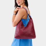 Orchid Oversized | Model wearing large shoulder bag with magnetic snap 