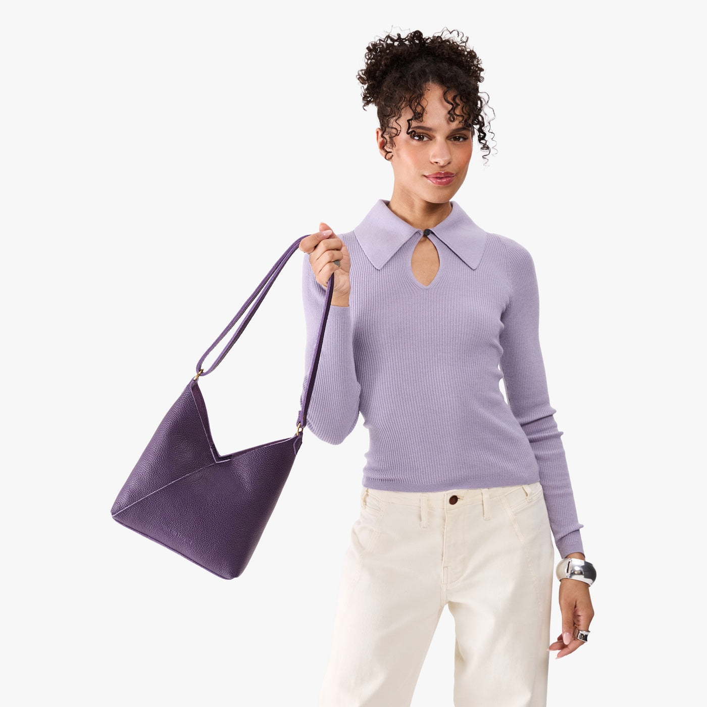 Empire*Small | Model wearing petite shoulder bag with adjustable strap and magnetic snap closure