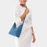 Mariner Blue Small | Model wearing petite shoulder bag with adjustable strap and magnetic snap closure