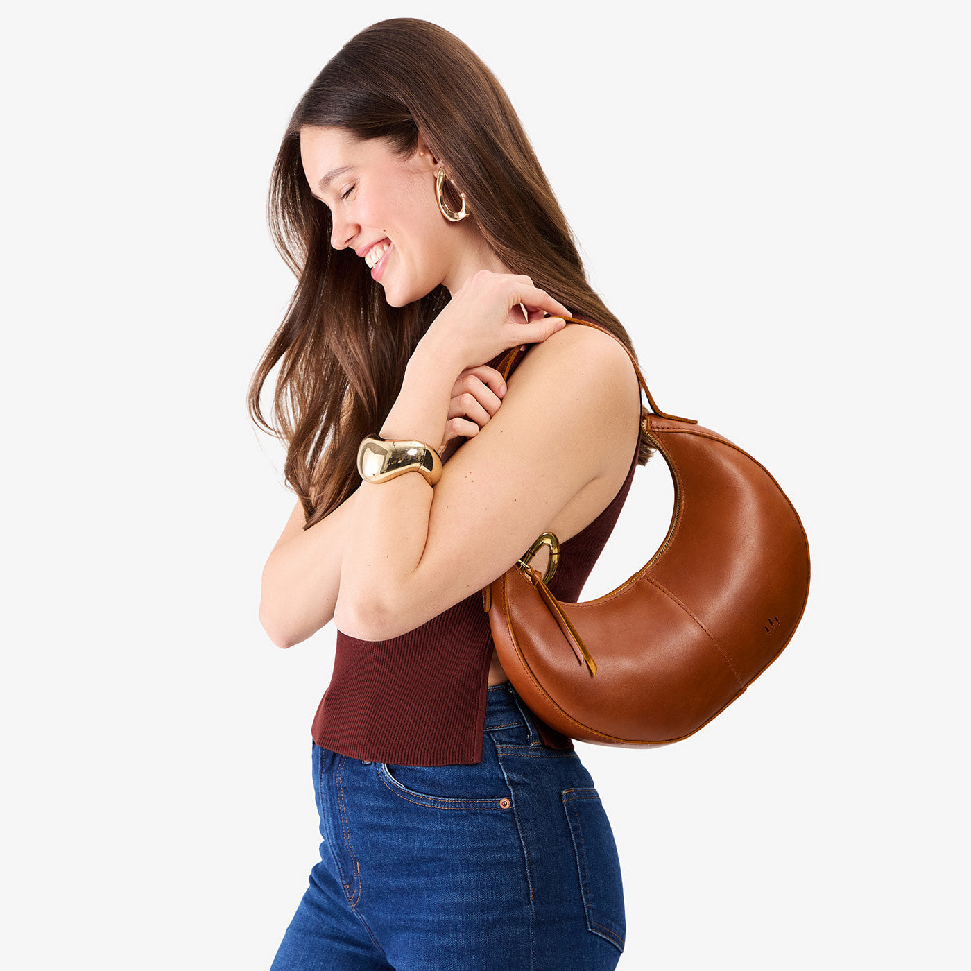 Honey*Classic | Crescent shaped shoulder bag with zipper closure and adjustable strap