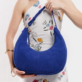 Joni Blue Large | Crescent shaped shoulder bag with zipper closure and adjustable strap