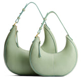 Pistachio | Crescent shaped shoulder bag with zipper closure and adjustable strap