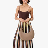 Stone Large | Crescent shaped shoulder bag with zipper closure and adjustable strap
