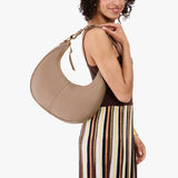 Stone Large | Crescent shaped shoulder bag with zipper closure and adjustable strap