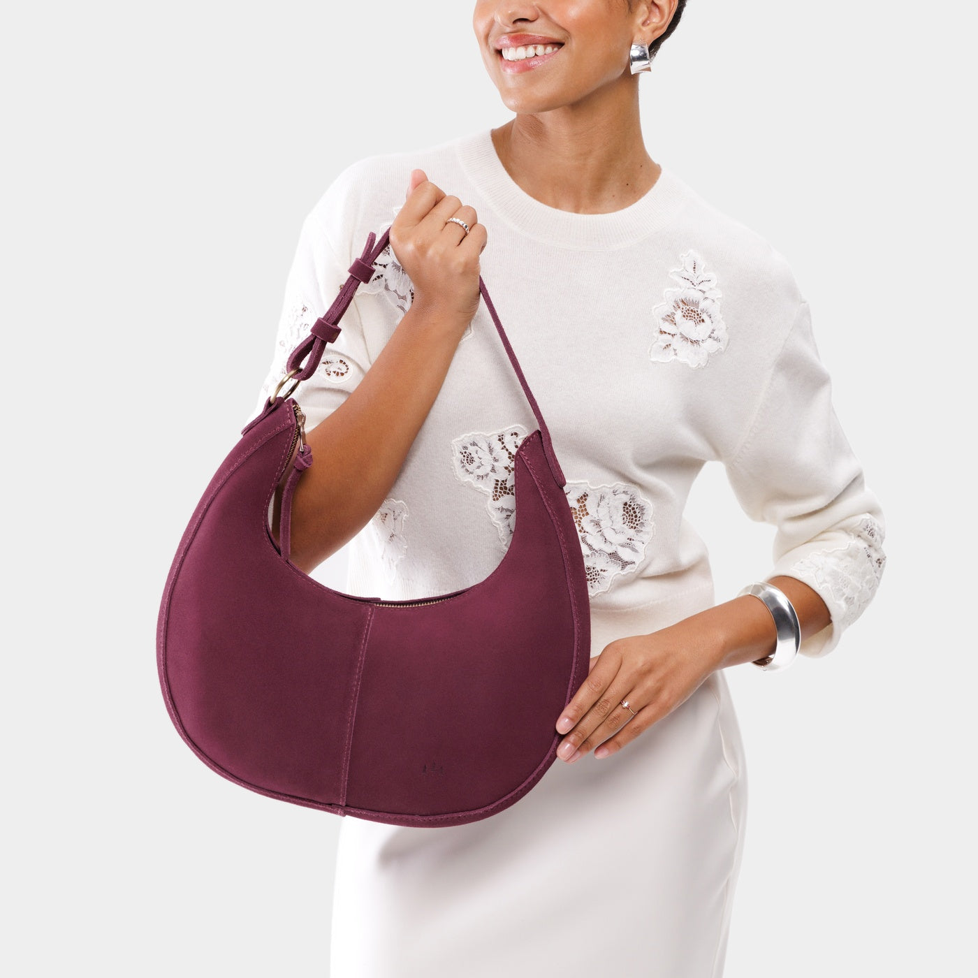 Superbloom*Large | Crescent shaped shoulder bag with zipper closure and adjustable strap