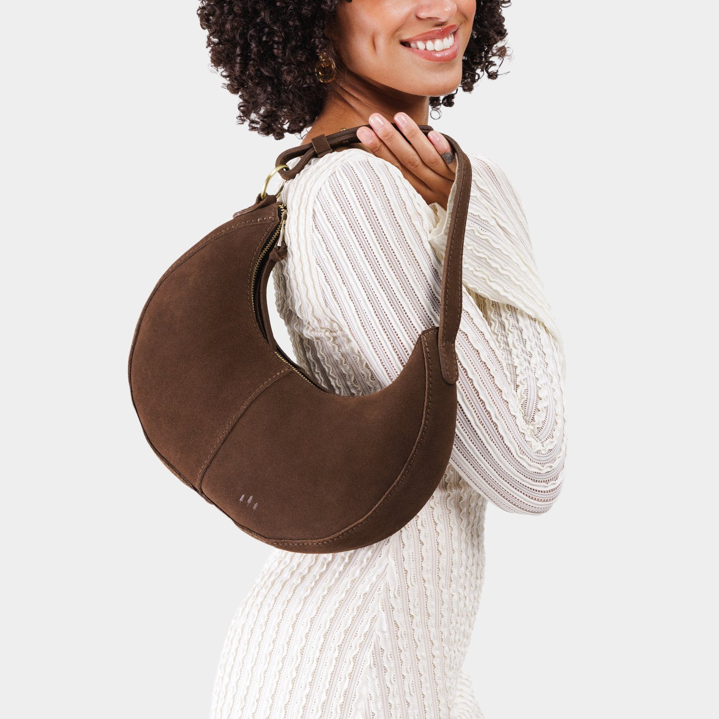 Stagecoach*Small | Crescent shaped shoulder bag with zipper closure and adjustable strap