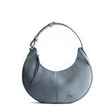 Storm Small | Crescent shaped shoulder bag with zipper closure and adjustable strap