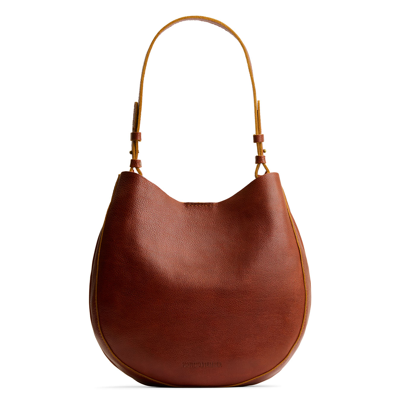 Nutmeg*Large | Rounded shoulder bag with adjustable strap on a white background