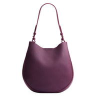 Plum*Large | Rounded shoulder bag with adjustable strap on a white background