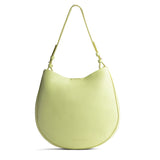 Shadow Lime Large | Rounded shoulder bag with adjustable strap on a white background