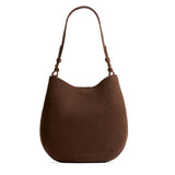 Stagecoach Large | Rounded shoulder bag with adjustable strap on a white background