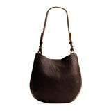 Coldbrew Medium | Rounded shoulder bag with adjustable strap on a white background