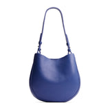 Molino Blue Medium | Rounded shoulder bag with adjustable strap on a white background