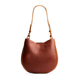 Nutmeg Medium | Rounded shoulder bag with adjustable strap on a white background
