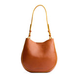 Sienna Medium | Rounded shoulder bag with adjustable strap on a white background