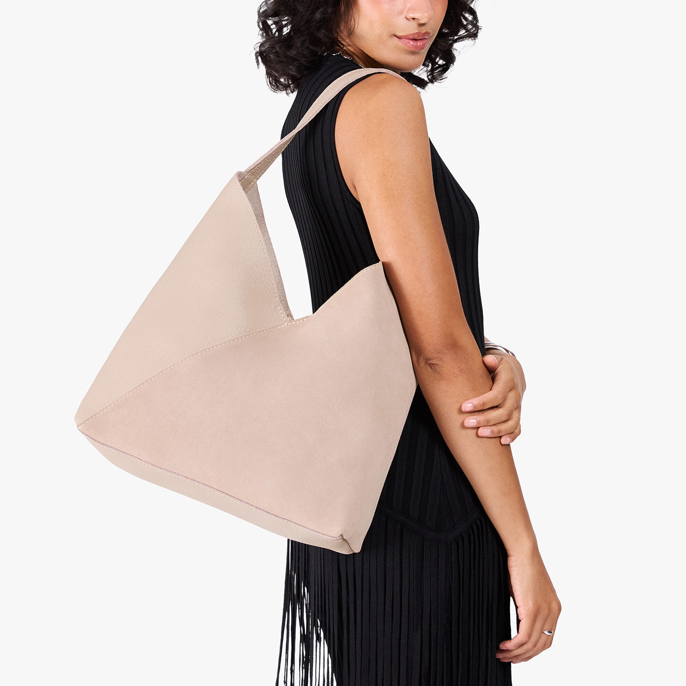 Toasted Oat*Oversized | Model carrying large shoulder bag with adjustable strap and magnetic snap closure