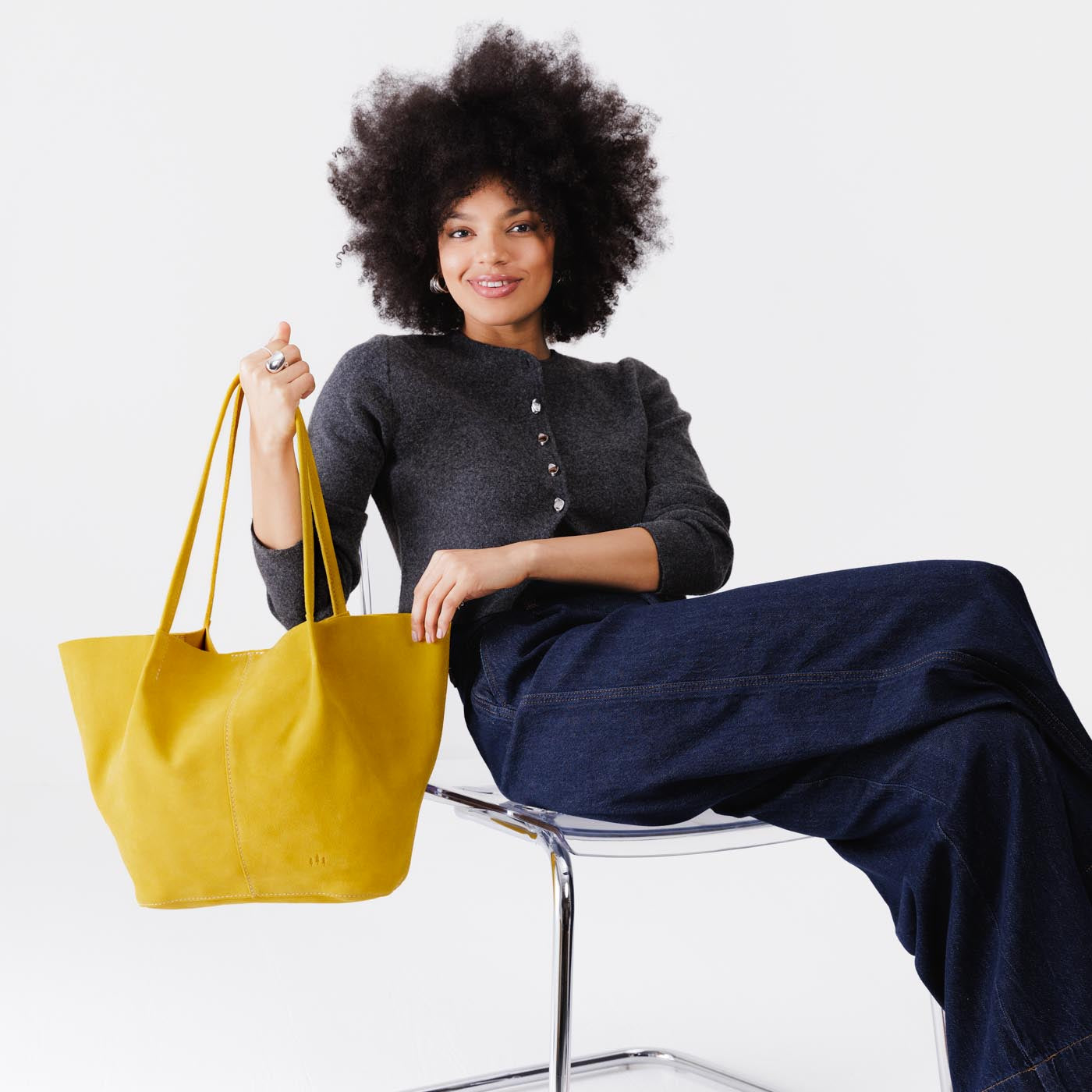 Hello Yellow*Oversized | Model holding a  leather tote bag 