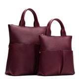 Cabernet | A comparison image of a Large and Small Pembroke Crossbody Clutch