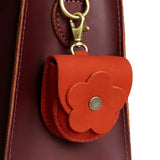 Paprika | U shaped pouch with layered leather flower cutout