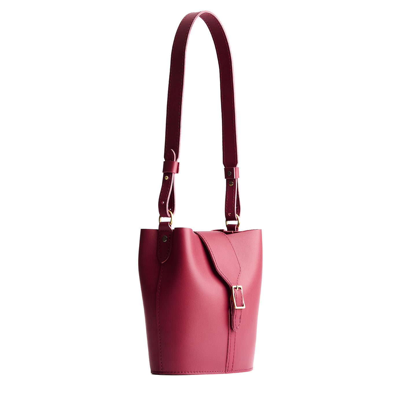 Berry Good | Leather bucket shoulder bag with adjustable strap and magnetic closure on a white background
