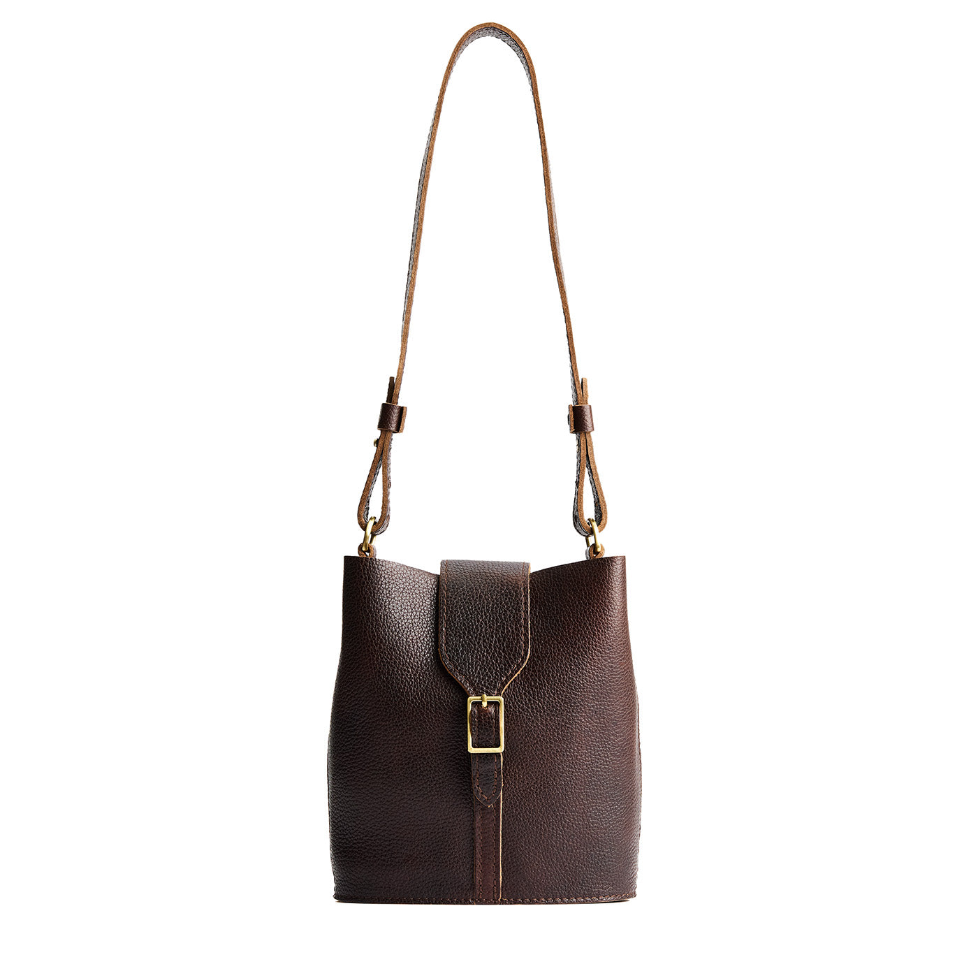 Coldbrew | Leather bucket shoulder bag with adjustable strap and magnetic closure on a white background