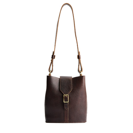 Coldbrew | Leather bucket shoulder bag with adjustable strap and magnetic closure on a white background