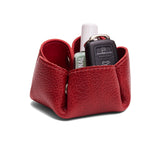 Cherry | Flower-shaped foldable leather tray with snap-button corners holding nail polish and car keys