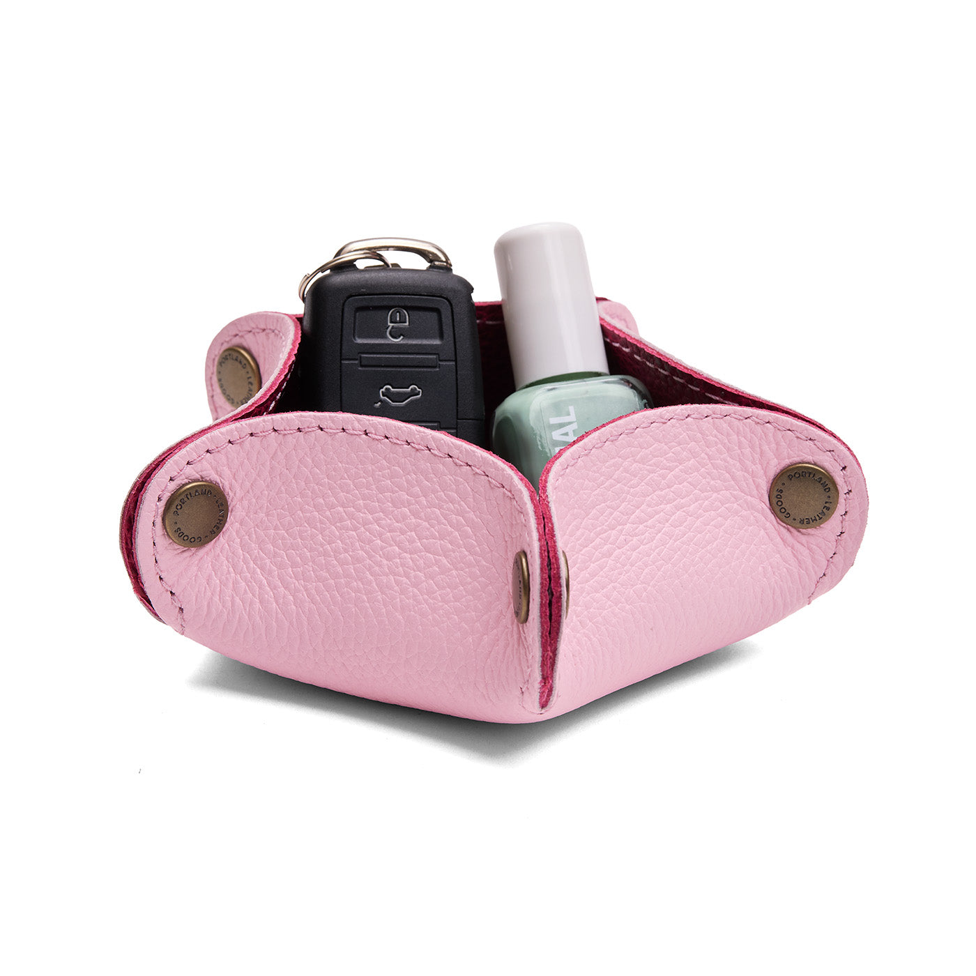 Pinkaboo | Star-shaped foldable leather tray with snap-button corners holding nail polish and car keys