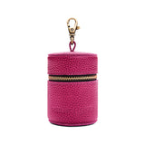 Cosmo | Cylindrical shaped pouch with a gold zipper and swivel lobster claw clasp