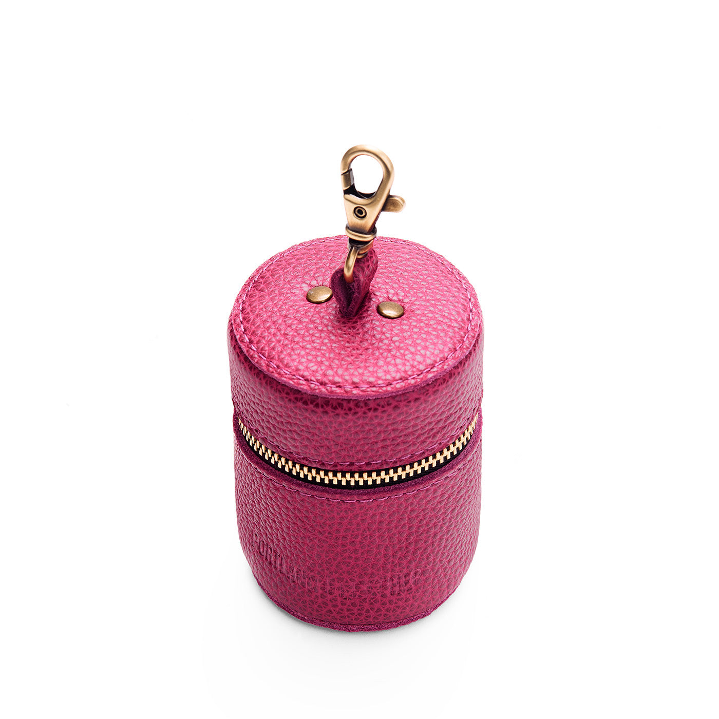 Cosmo | Cylindrical shaped pouch with a gold zipper and swivel lobster claw clasp