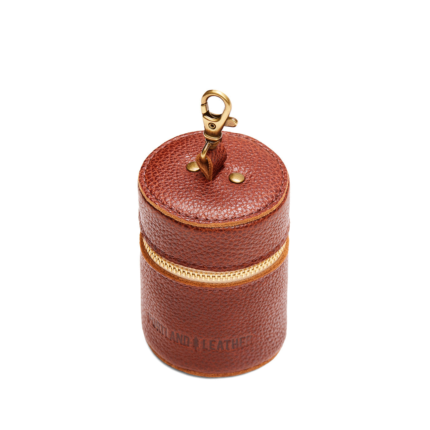 Nutmeg | Cylindrical shaped pouch with a gold zipper and swivel lobster claw clasp