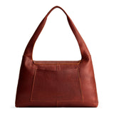 Nutmeg Large | Slouchy triangle shaped shoulder bag with a flap