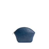 Caspian Small | Seashell shaped leather makeup bag with curved top zipper and flat bottom