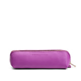 Cattleya | Leather pouch with curved seams and top zipper