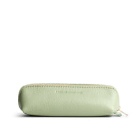 Pistachio | Leather pouch with curved seams and top zipper
