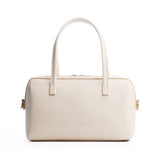 Pebbled Bone Large | Mini duffle shaped handbag with crossbody strap