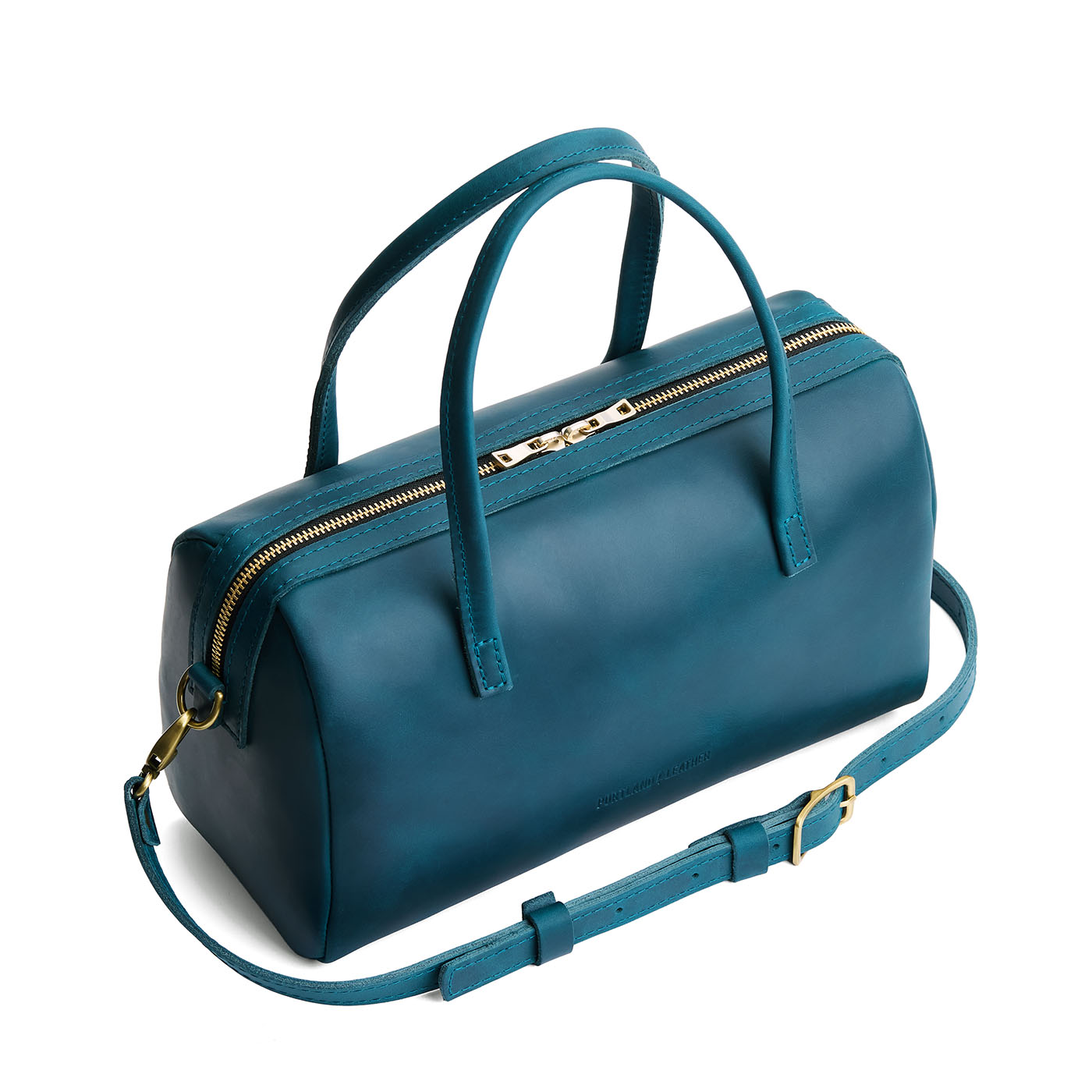 Westward Blue*Oversized | Mini duffle shaped handbag with crossbody strap