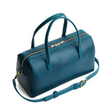 Westward Blue Oversized | Mini duffle shaped handbag with crossbody strap