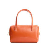 Koi Small | Mini duffle shaped handbag with crossbody strap
