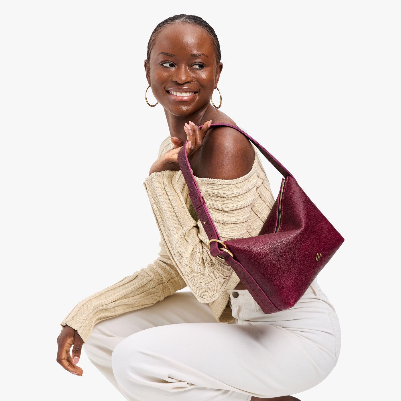 Orchid*Small | Petite slouchy leather shoulder bag with zipper opening and three metal tree emblems