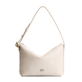 Pebbled Bone Small | Petite slouchy leather shoulder bag with zipper opening and three metal tree emblems
