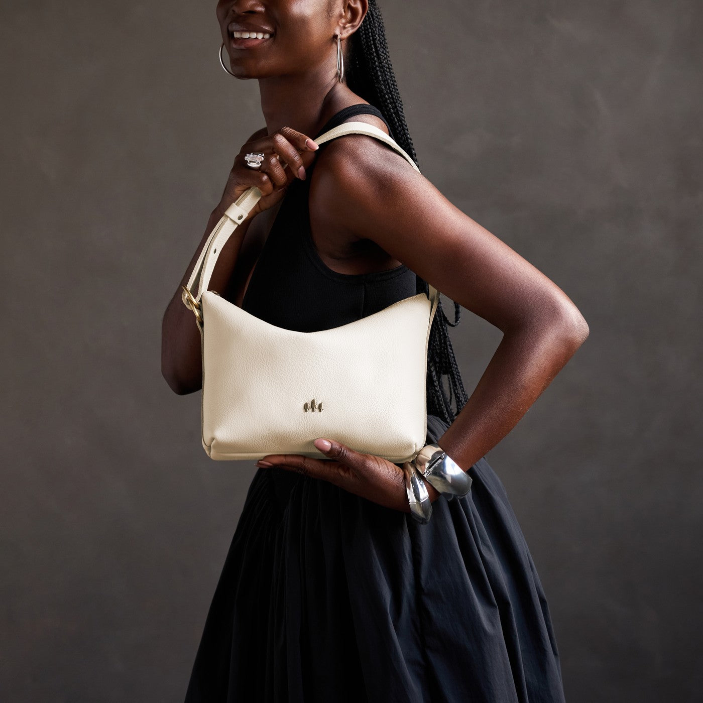 Pebbled Bone*Small | Petite slouchy leather shoulder bag with zipper opening and three metal tree emblems