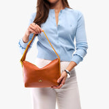 Sienna Small | Petite slouchy leather shoulder bag with zipper opening and three metal tree emblems