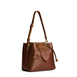 Asheville Small | Symmetrical leather bag with leather drawstring closure and adjustable shoulder strap
