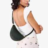 Evergreen Small | Model wearing petite half circle shaped sling bag