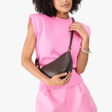 Grizzly Small | Model wearing petite half circle shaped sling bag