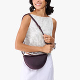 Larkspur Small | Model wearing petite half circle shaped sling bag