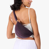 Larkspur Small | Model wearing petite half circle shaped sling bag